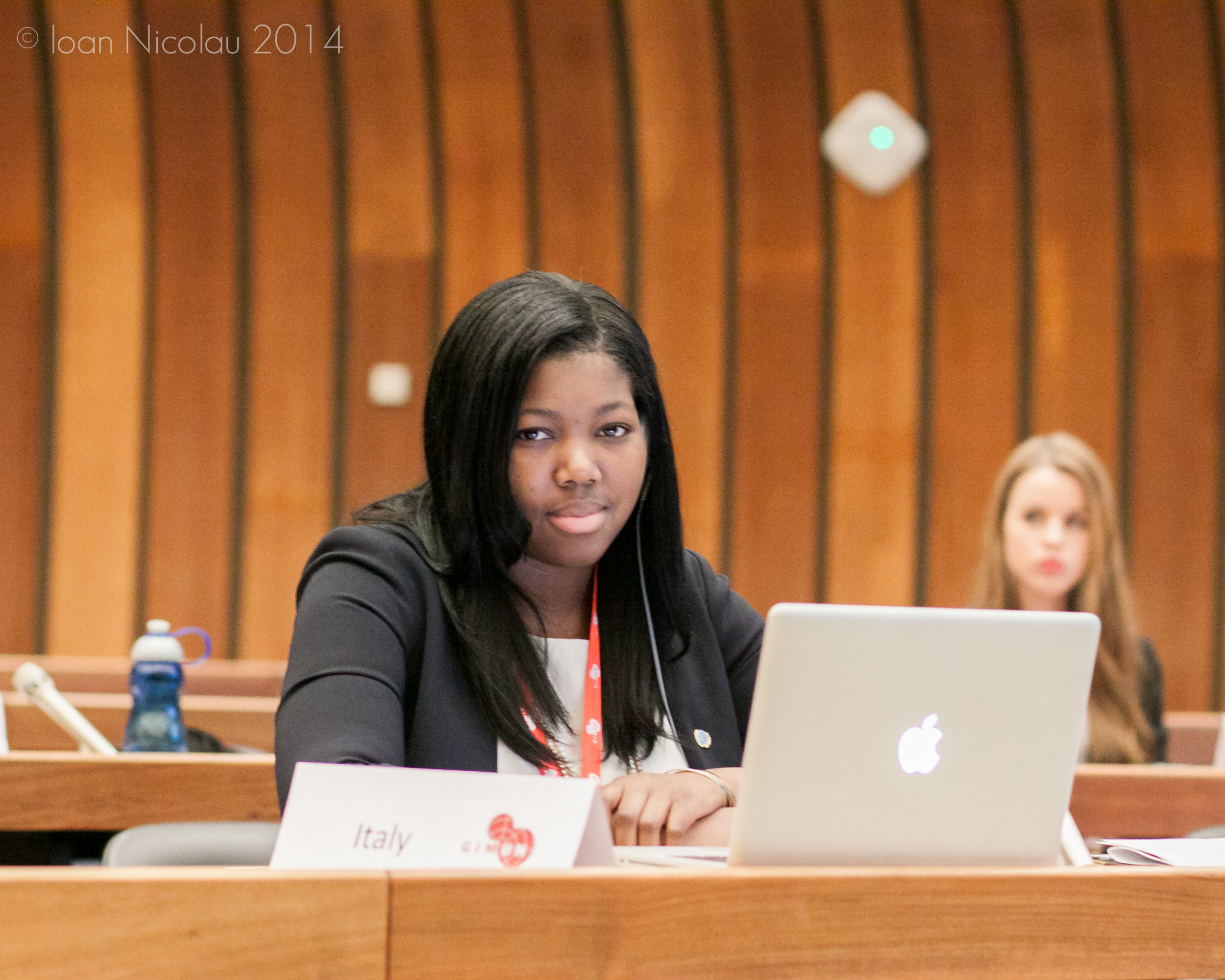 Pace University student Shade Quailey '15 representing Italy in  a simulation of the Human Rights Council at the 2014 Geneva International Model UN conference.
