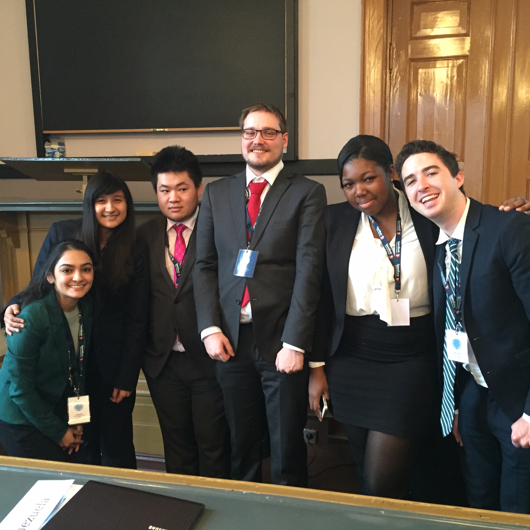 Pace New York City Model UN students (Priya Sakaria '17 and Jennifer Diaz '16 on the left and Shade Quailey '15 and Niall O'Reilly '16 on the right) who participated in the simulation of the United Nations Human Rights Council with their committee chairs (in the center)..