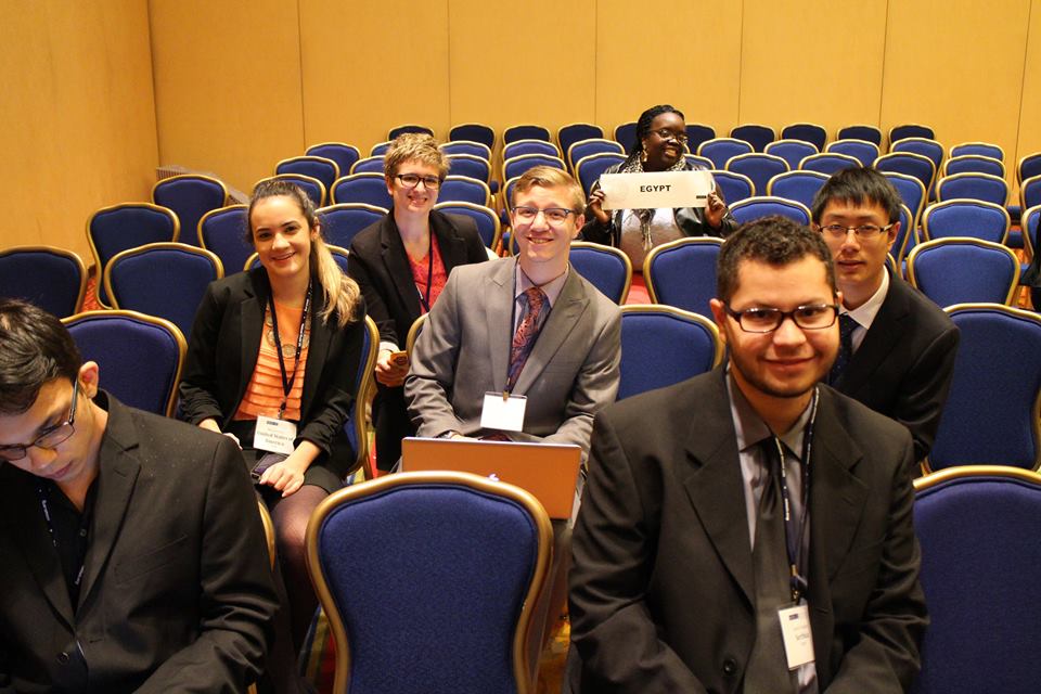 Pace University New York City students Nick Mucerino (front row, left) and Jason Vargas (front row, right) represented Serbia in a simulation of the UN Environmental Programme at the 2015 National Model UN conference in Washington DC and were recognized with an Outstanding Position Paper award