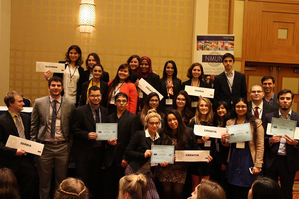 Pace University New York City Model United Nations students show off some of the seven awards they won at the 2015 National Model UN conference in Washington DC.